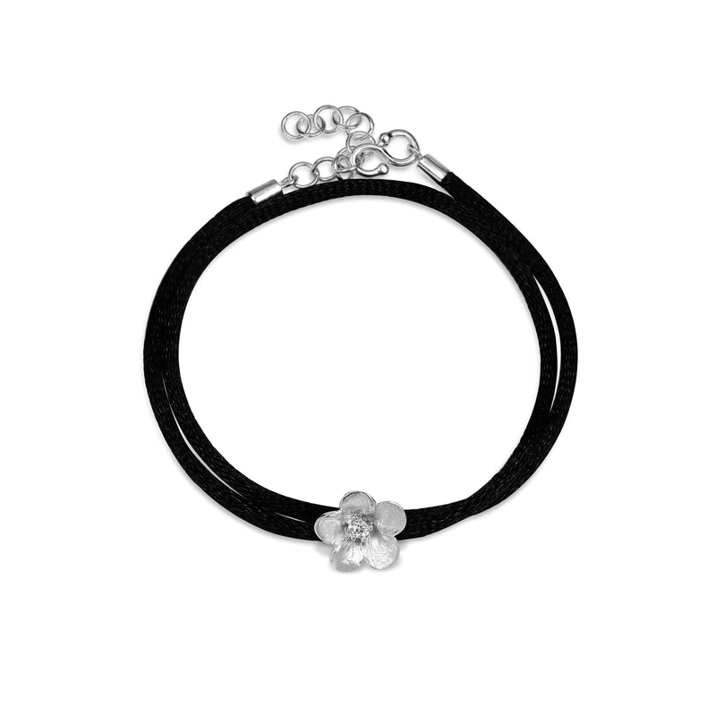 Armbånd silkesnor med sterlingsølv blomst og kubisk zirkonia.