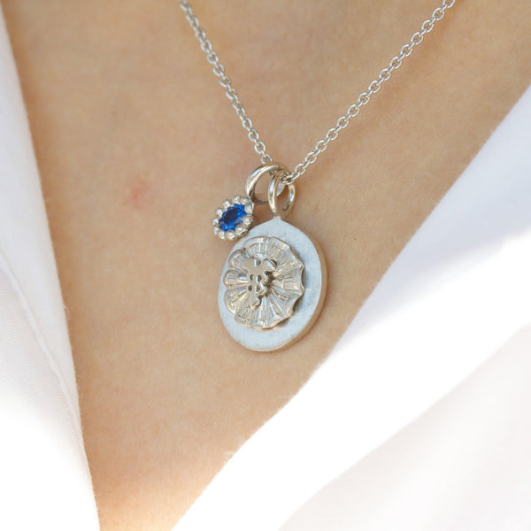 Sterling silver necklace with HTX cockade and blue spinel