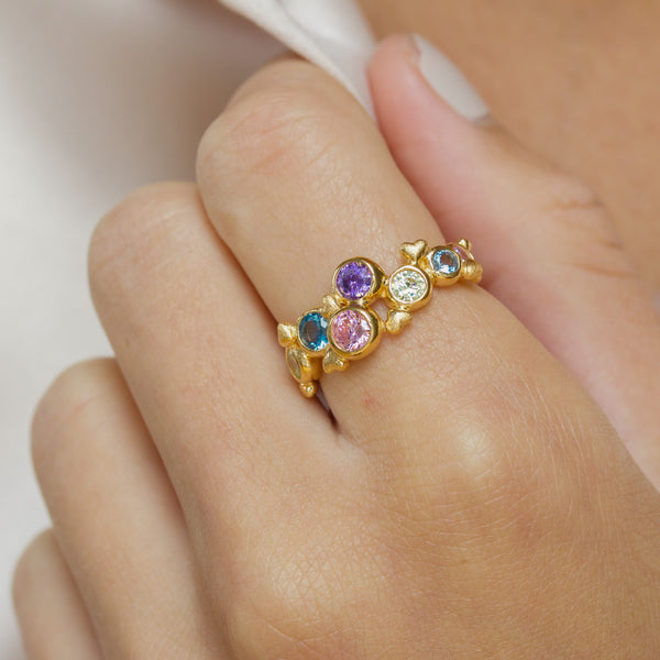 Small gold-plated sterling silver ring with a mix of cubic zirconia