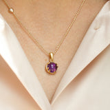 14 kt 'Conjure' gold necklace with cabochon-cut amethyst
