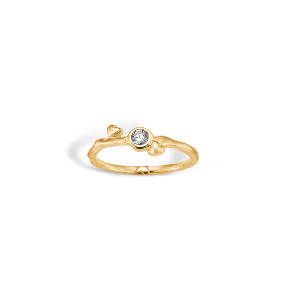 9 kt gold ring with twisted branch and large cubic zirconia