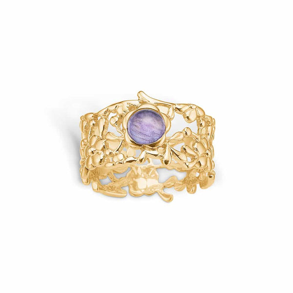14 kt gold ring with floral pattern and blue tourmaline