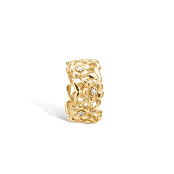 14 kt gold ring with matte flowers and 8 diamonds