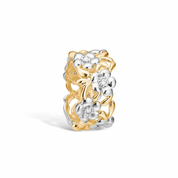14 kt gold ring with rhodium-plated diamond-studded flowers