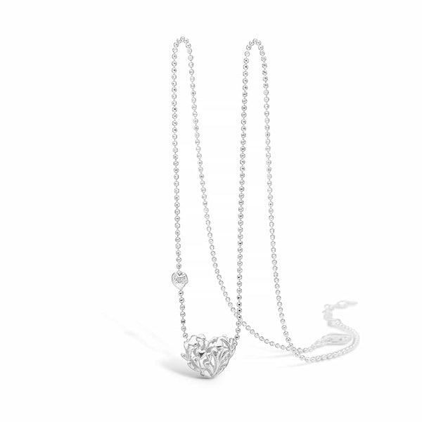 Sterling silver necklace with filigree heart pendant