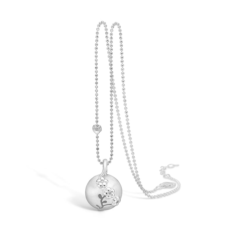 Sterling silver necklace matte ball pendant with flowers and cubic zirconia