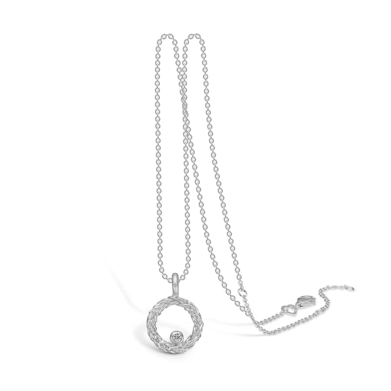 Sterling silver necklace with matte braided wreath and a cubic zirconia