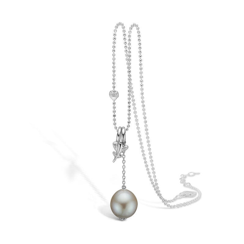 Silver necklace with freshwater pearl and small loose branch pendant