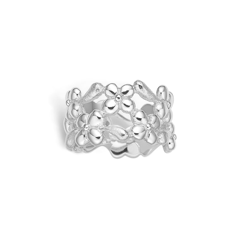 Sterling silver ring with shiny flowers