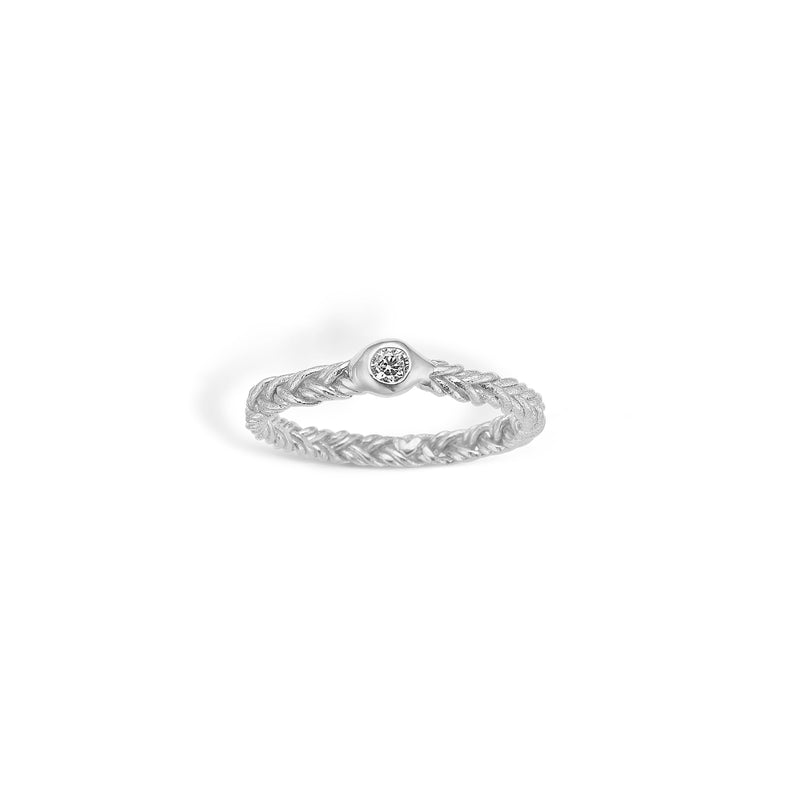 Sterling silver ring with braided pattern and cubic zirconia