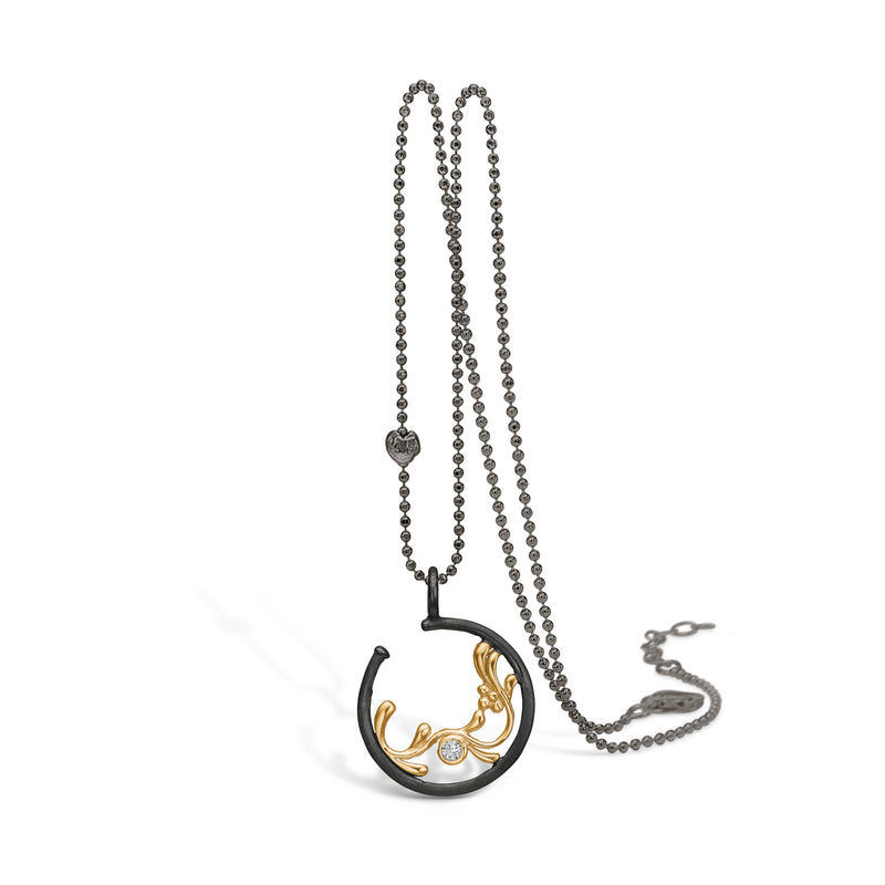 Oxidized sterling silver necklace with gold-plated branch