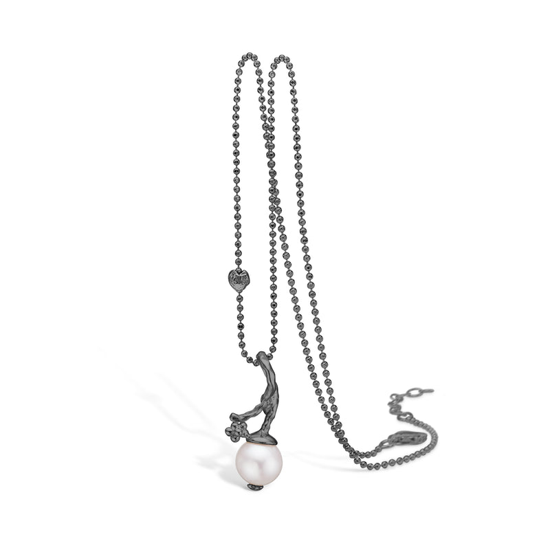 Oxidized silver necklace branch with small flower and freshwater pearl