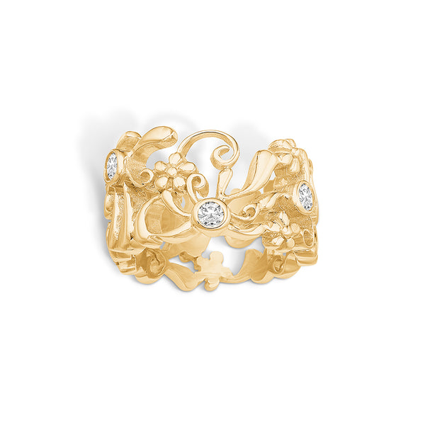 Gold-plated sterling silver ring with a pattern of branches and flowers with cubic zirconia