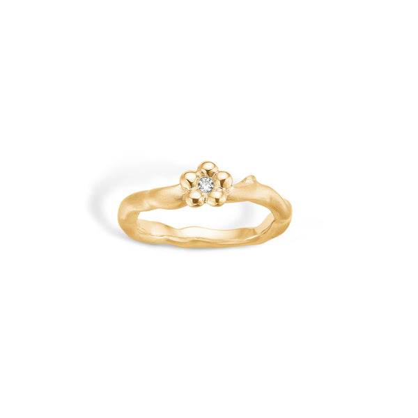 Gold-plated silver ring with small flower and cubic zirconia 