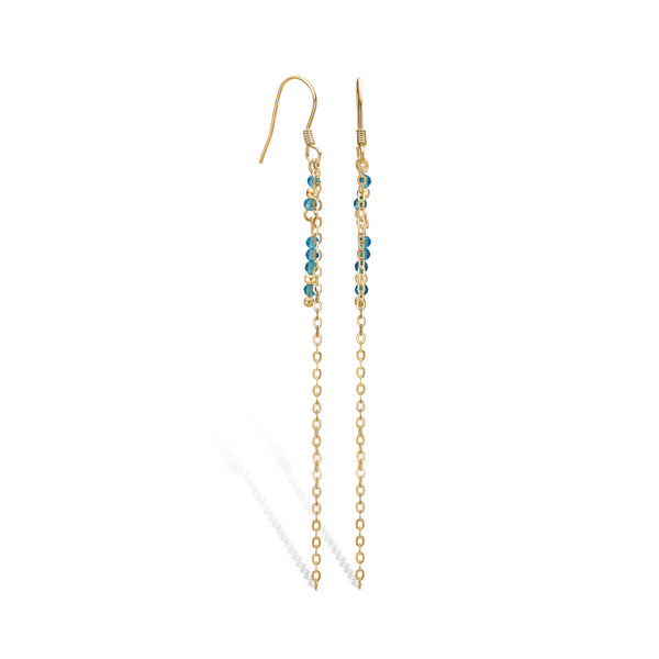 Gold-plated silver earrings with blue topaz