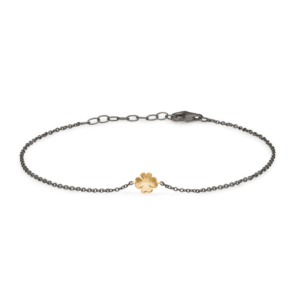 Black rhodium-plated sterling silver bracelet with matt gold-plated four-leaf clover