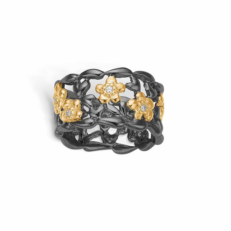 Black rhodium-plated silver ring with gold-plated flowers