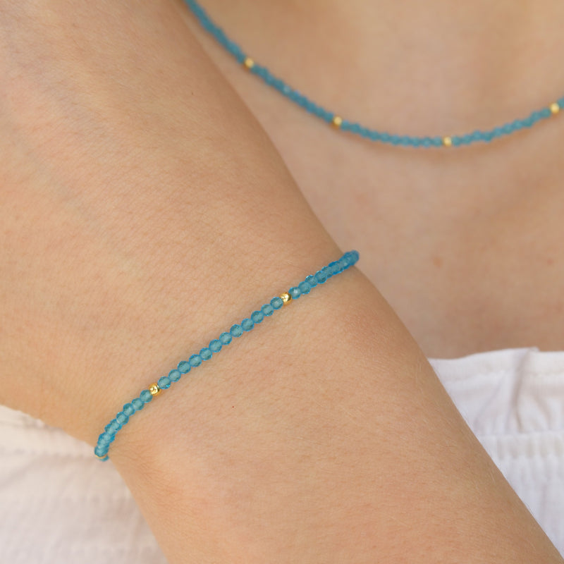 Gold-plated sterling silver stone bracelet with blue topaz