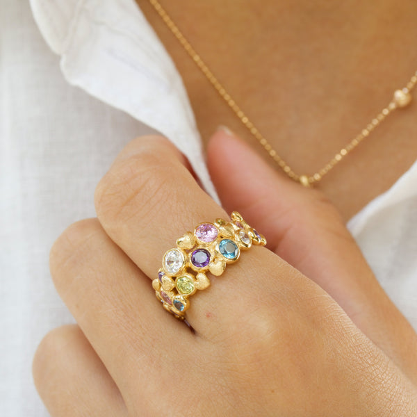 Gold-plated sterling silver ring with a mix of cubic zirconia