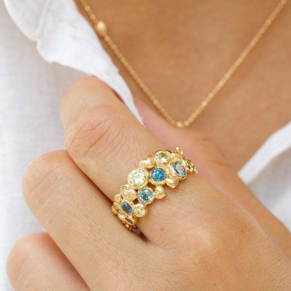 Gold-plated sterling silver ring with blue and green cubic zirconia