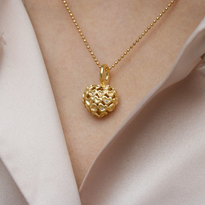 Gold-plated sterling silver necklace with ball of hearts