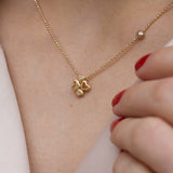 14 kt gold necklace with hearts and diamonds