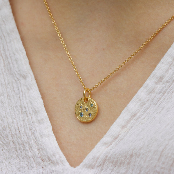 Gold-plated silver necklace with rustic plate and blue cz