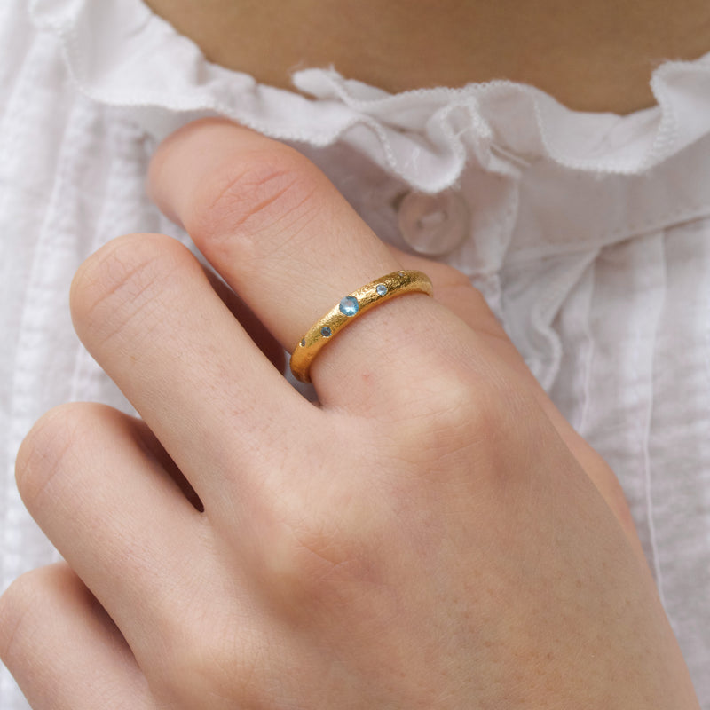 Gold-plated silver ring with sprinkles of blue cubic zirconia
