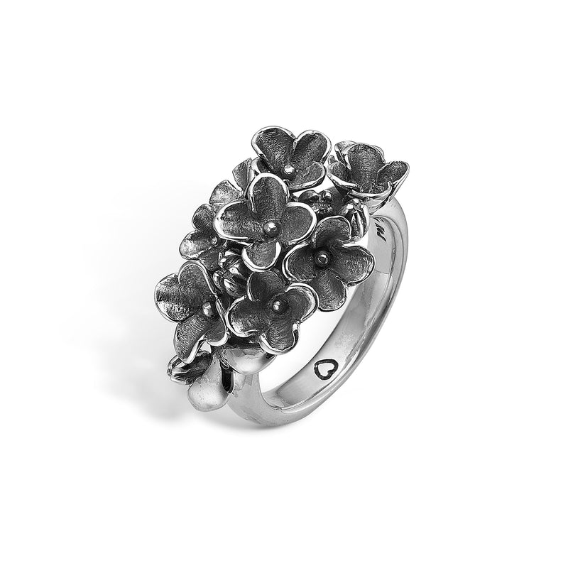 Oxidized finger ring with acid flowers