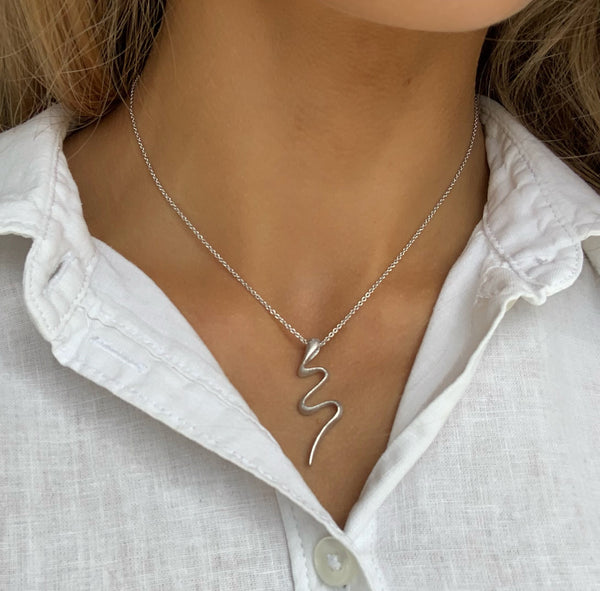 Silver necklace with snake pendant